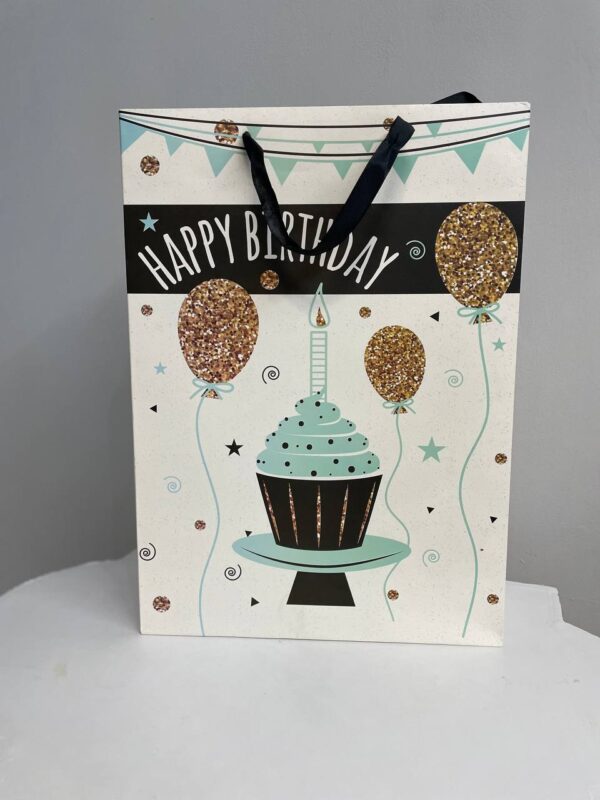Паперовий подарунковий пакет з написом Happy Birthday, капкейком та святковими кульками