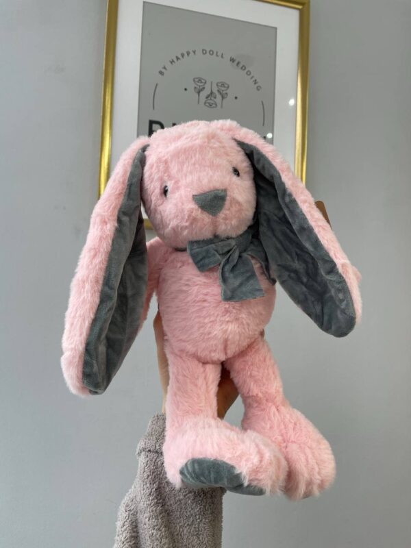 Рожевий плюшевий зайчик з сірими вушками та бантиком